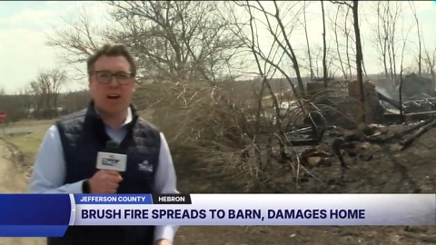 Couple flees as out-of-control brush fire nearly destroys Jefferson Co. home