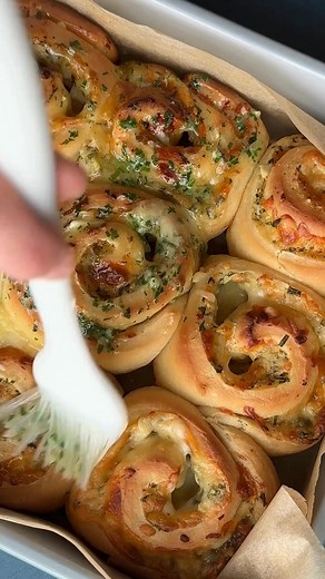 instead of filling the fluffy dough with cinnamon and sugar, we're layering on garlic-herb butter and shredded cheeses. The result is a light and fluffy swirl with rich, savory flavors. It's our new favorite brunch bread. Ingredients Dough 3 1/2 to 3 3/4 cups all-purpose flour (420 to 450 grams) 1 package active dry yeast (2 1/4 tsp.) 1 cup milk or buttermilk 1/4 cup sugar 1/3 cup butter 3/4 tsp. salt 1 large egg Filling 3/4 cup butter, softened 1/4 cup finely-chopped parsley 1/4 cup chopped chi