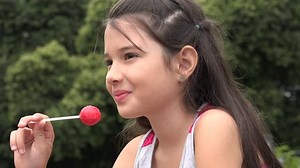 Girl Eating Candy Sweets Sugar Stock Footage Video (100% Royalty-free) 8374906 | Shutterstock