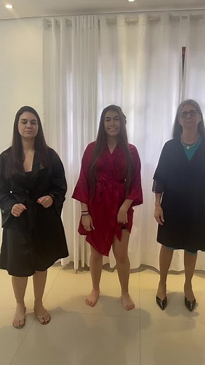 Synchronized Dance Performance in Elegant Gowns