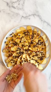 157K views · 193 reactions | Apple Nachos are one of our favorite after school snacks for this time of year. Here’s how I did it: Slice some apples and arrange on a plate. Warm some peanut butter and drizzle over (a plastic bag works great! Just snip the end) drizzle over some caramel. Add some mini chocolate chips. I added some crushed salted caramel pretzels for crunch — so good! | The Recipe Rebel | Facebook