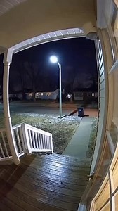 A wide-angle security camera view from a porch. Tall streetlight #amazing #strange #usa #reels #cctv | Canal Gioh