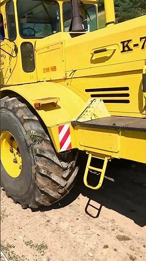💥🚜 Pulling Power: K-700 on the Uphill Road.