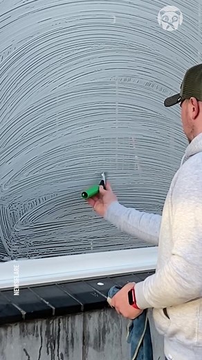 Guy makes Wi-Fi icon while cleaning window | Awesome