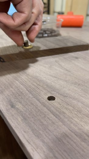 Plug to cover up a scew used during assembly. Solid walnut. #woodworking #reels #furnituremaker #process #woodshop #tools | Boundary Fog Furniture