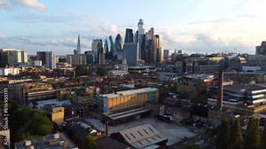 Drone flying backwards over Shoreditch with Truman Brewery and Brick Lane