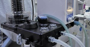 Artificial lung ventilation apparatus works in surgery veterinary clinic. Gas anesthesia machine in the process of working in a veterinary operating room. Anesthesia equipment concept.
