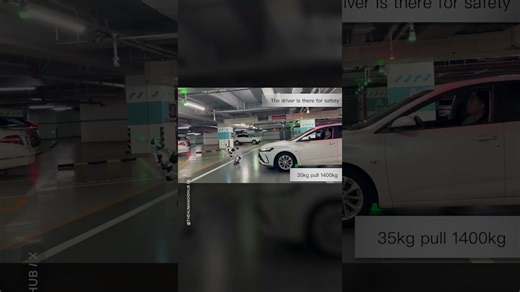 Watch a small humanoid robot pull a car with surprising ease