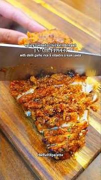 Spicy tomato chicken in air fryer served with chilli garlic rice and cilantro cream sauce #recipe