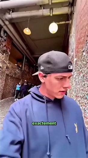 Challenge: Chew a piece of used gum that's been stuck to the wall for a year on the dirtiest wall...
