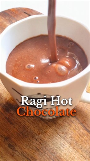 Dr Kanupriya Middha on Instagram: "Recipe📌 Ragi Hot Chocolate (Serves 1) Ingredients 1 cup milk (dairy or plant-based) 1 tbsp ragi flour 1½ tbsp unsweetened cocoa powder 2-3 soft dates, deseeded 1 pinch cinnamon (optional) Method 1. Soak dates in 1/4 cup milk amd blend well. 2. Transfer it to a pan alogn with remaining milk. 3. Mix ragi flour and cacao powder with water to make a slurry. 4. Add the ragi slurry and cook, stirring continuously, till thick and glossy. 5. Simmer 2–3 minutes, strain