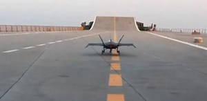 Humiliating moment Iran unveils TINY toy stealth fighter jet in bizarre clip