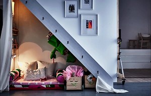 An under-the-stairs escape is a totally cosy spot to curl up with a favourite toy, book, or even to just take a nap. | IKEA