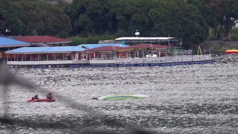 Paraglider crashes into lake during accident simulation