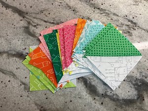 Starching fabrics Helps! - 4 at a time Half Square Triangles