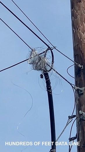 On scene of a utility pole fire we observe hundreds of feet of data line cut, pulled, stripped… all along the north side of the interstate. >> Click https://bit.ly/3OOjMgl — It’s apparent the tampering of the data lines caused a pole to break, starting a fire, a source tells us. Joplin Police tell us they have not been contacted to investigate. It is outside the city. | Joplin News First