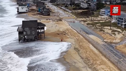 Water engulfs homes as powerful nor'easter slams North Carolina's Outer Banks