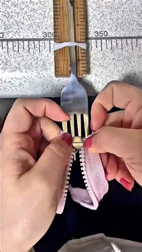 Fix your broken zipper in seconds using a fork! #LifeHack #DIY #ZipperFix #SmartTips