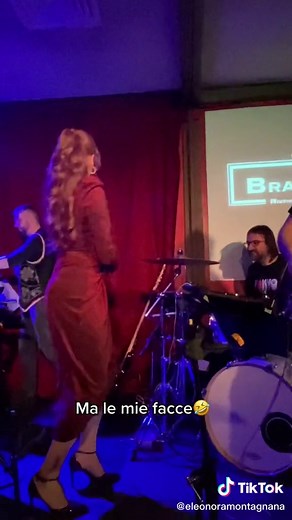 Electric Violinist Live Performance in Dim Venue