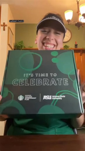 Starbucks Partners on Instagram: "It’s time to celebrate! 🎓 ASU graduation is right around the corner for our December ’25 graduating class through the Starbucks College Achievement Plan (SCAP). Through SCAP’s upfront 100% tuition coverage, partners are earning their degrees without the financial barrier. Celebrate with Bianca, shift supervisor and 10 year partner, as she unboxes her SCAP swag bag! We can’t wait to see you rocking your SCAP green apron 💚 #ToBeAGraduate"