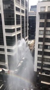 A great view of a burst fire hydrant on the corner of Queen St and Flinders Lane in Melbourne. ☔️ Credit: Molly Knight | 10 News Melbourne