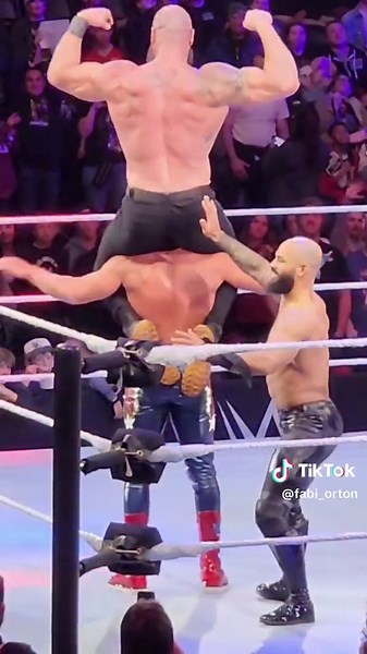 Cody Rhodes Lifts Up Braun Strowman in WWE Wrestling Match