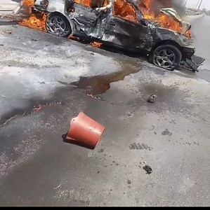 Man Burning Alive Trapped in a Car