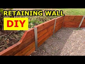 DIY Retaining Wall. A step by step instruction on building your own retaining wall. #diyproject