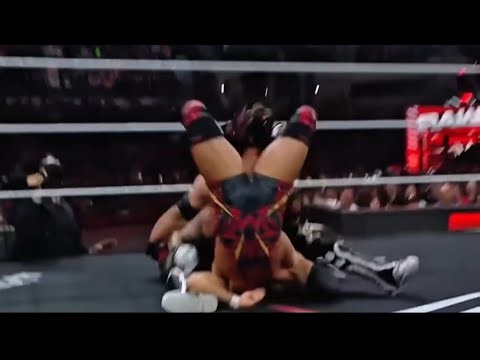 Pénta accidentally hits the Tiger Driver '98 on Chad Gable after attempting a unique move