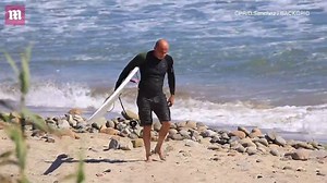 Dominic Purcell enjoys day surfing after marrying Miley Cyrus' mother Tish