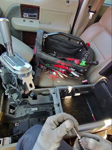 How to remove the center console lid armrest from a 2004 2005 2006 2007 2008 Ford F150 #fordf150