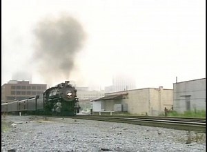 If you squint and ignore the modern buildings (and billboards), you can almost see the past coming down the tracks! This is Frisco 1522 on excursion duty. From "Atlanta Steam Celebration". On sale: $9.95! http://rfd.video/AtlantaSteam | Railfan Depot