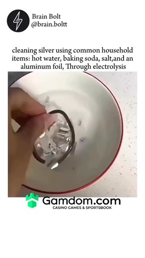 BRAIN BOLT on Instagram: "Your silver isn’t dirty. It’s just doing chemistry behind your back. This cleaning method works by reversing tarnish through electrolysis, not scrubbing. When silver reacts with sulfur in the air, it forms silver sulfide, that dull black layer everyone hates. Drop hot water, baking soda, salt, and aluminum foil into the mix, and you’ve basically built a tiny chemistry lab in your kitchen. Here’s the trick: aluminum is more reactive than silver. In the hot, salty solutio