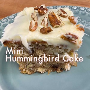 RECIPE: https://onedishkitchen.com/hummingbird-cake-recipe/ This tropical Small Hummingbird Cake recipe is a wonderfully moist cake made with a banana, pineapples, and chopped pecans. It's a delicious scaled down version of a southern classic and is frosted with an irresistibly rich cream cheese icing! | One Dish Kitchen - Your Cooking For One Source