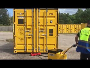 Moving a 10ft shipping container using MasterMover AT200 tow tug