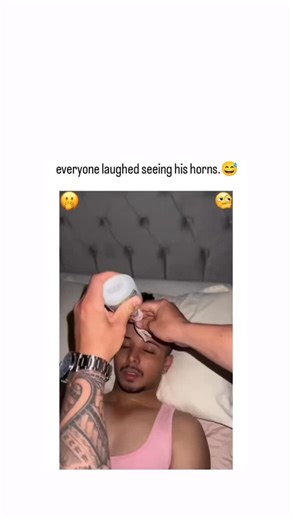 Wise Brain Hub on Instagram: "The X post shares a 64-second prank video depicting friends secretly attaching a pink hair scrunchie to a sleeping man’s head to form comical “horns,” capturing his bewildered reaction in a mirror and ensuing group laughter in a casual home setting. Released on December 7, 2025, by bluechocolade —a user known for whimsical, feel-good content-the clip exploded to over 33,000 likes and 5.3 million views within 48 hours, underscoring the platform’s affinity for spontan