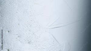 Growing ice crystals freezing water under microscope Stock Video