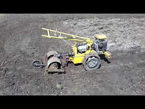Homemade two wheel behind tractor with rotavator