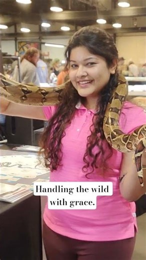 Python #snake #python Handling the wild with grace. #shorts #viral
