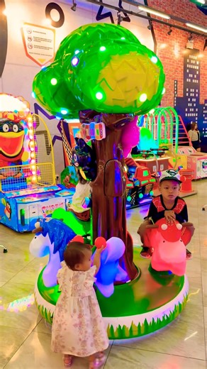 Riding the cutest mini horse tree carousel ever—so much fun! 🎠🐴✨ #cute