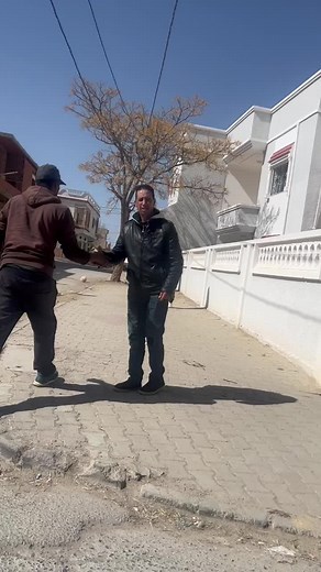 Urban Handshake Agreement Between Two Men