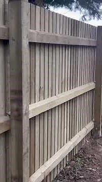 Beautiful Feather Edge Post and Rail Fence Installation for a Timeless Outdoor Look!