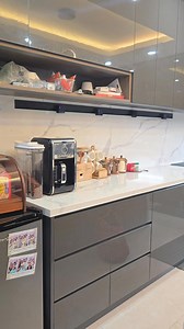 No extension cords. No fixed outlets in the wrong spots. Just power exactly where you need it. This kitchen keeps things clean with a black Mainline Power track tucked under the upper cabinets. Coffee machine on one end today, air fryer on the other tomorrow. Just slide the sockets wherever works best. Modern kitchens deserve flexible power. | Mainline Power Philippines Presented By Nooovle