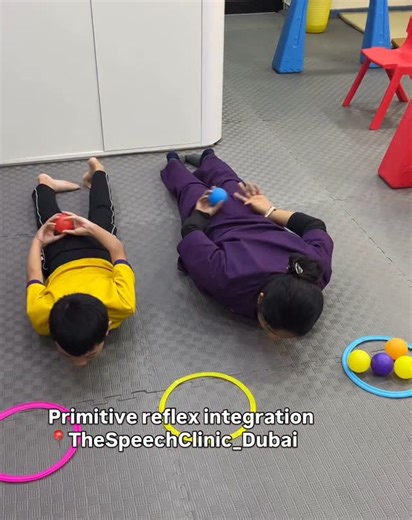 The Speech Clinic Dubai on Instagram: "🎯 Integrating Reflexes through Play! When we work on TLR (Tonic Labyrinthine Reflex) and ATNR (Asymmetrical Tonic Neck Reflex), it’s not just about movements — it’s about building the foundation for postural control, coordination, and attention. 💪 Through play-based activities, children learn to move with better body awareness, balance, and bilateral coordination — skills essential for reading, writing, and speech motor planning! ✨ Play is therapy, and th