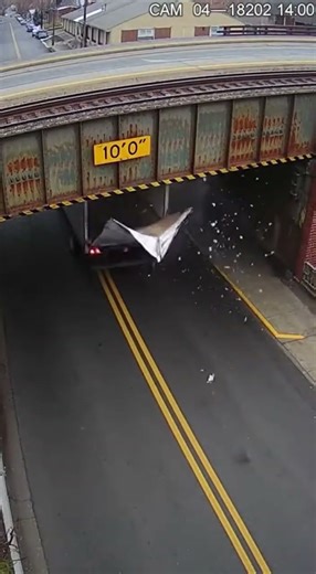 The Infamous "Can Opener" Bridge Strikes Again! 🚛💥