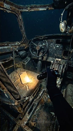 I found a gold iPhone underwater inside a WWII bomber wreck… how is this possible? 😨📱