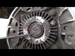 replacing a 89-98 geo tracker timing belt water pump thermostat and fan clutch pt2