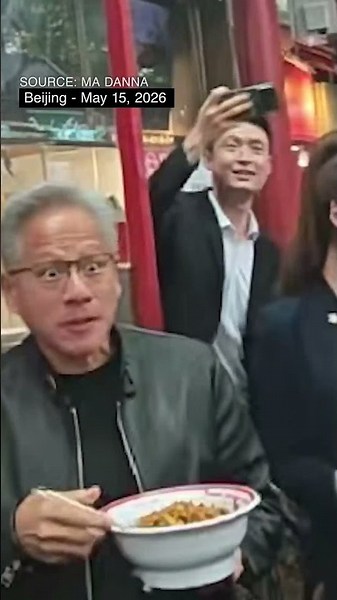 Nvidia's Jensen Huang Spotted Eating Noodles on Beijing Sidewalk During Trump Visit