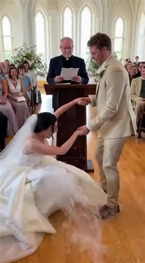 Bride's Dress Turns into Mini Fountain at Wedding