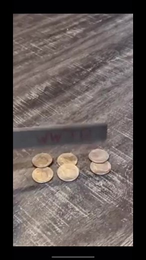 Measuring Gold Coins with Metal Ruler Technique